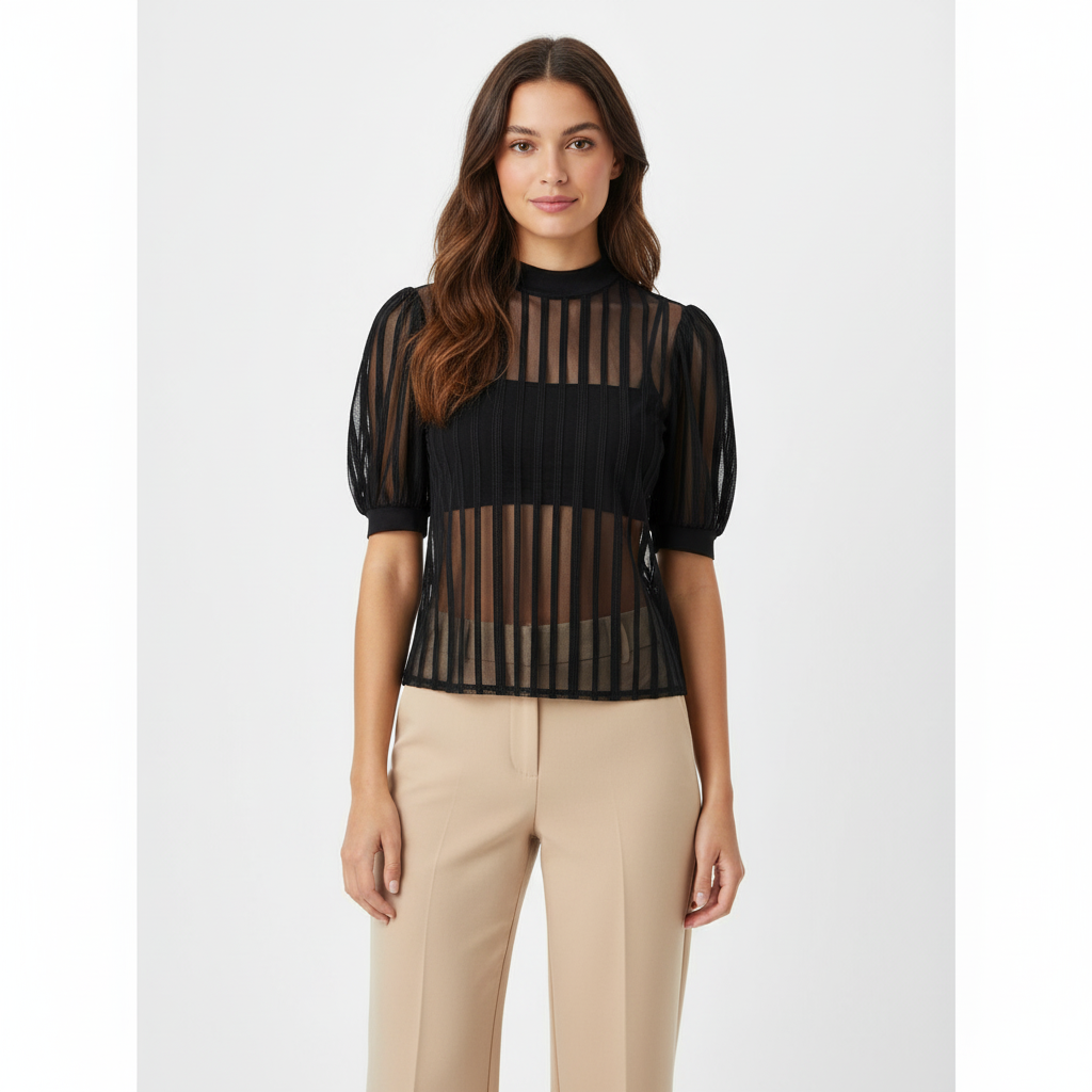 Blusa manga corta tipo farol que combina delicadeza y estructura