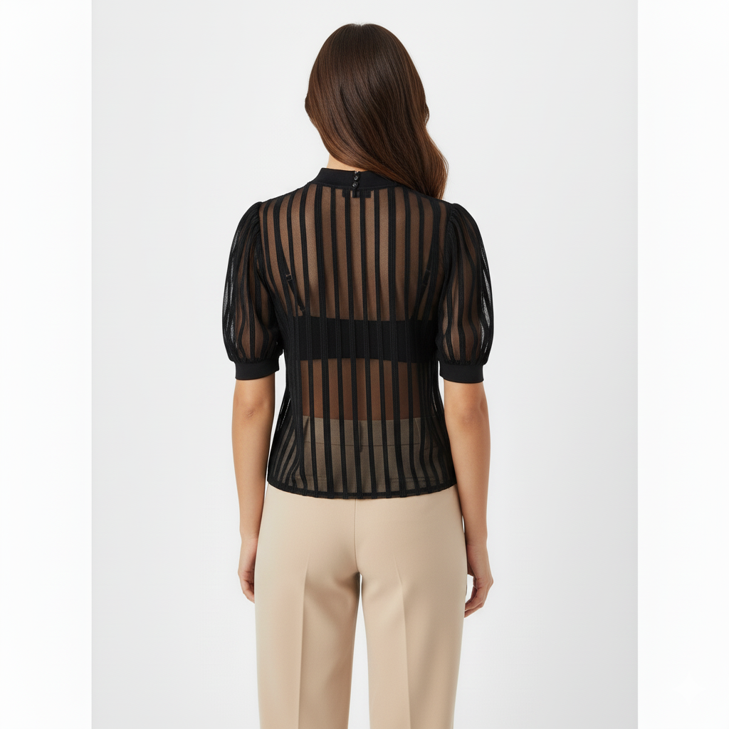 Blusa manga corta tipo farol que combina delicadeza y estructura