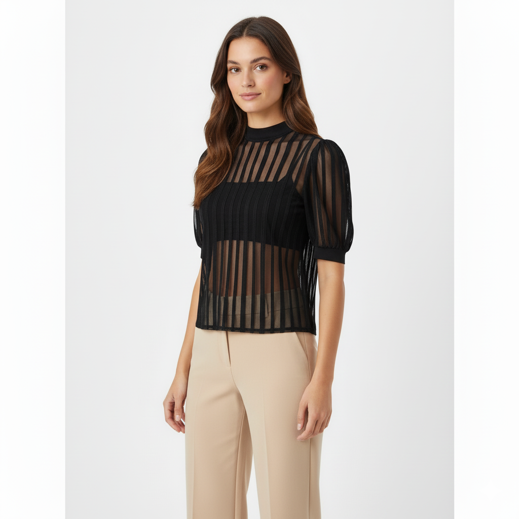 Blusa manga corta tipo farol que combina delicadeza y estructura
