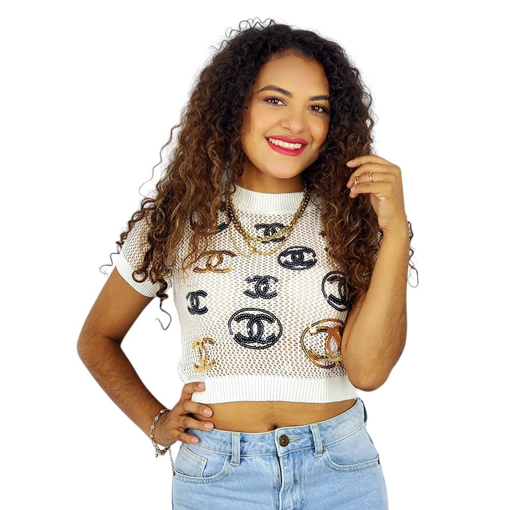 Blusa corta tipo malla con brillo de lentejuelas que resalta tu estilo único