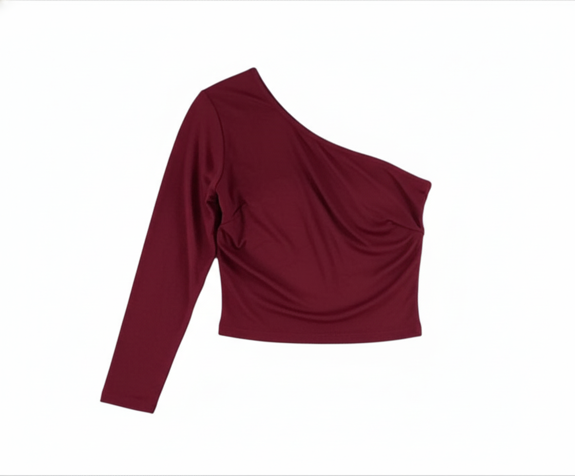 Blusa asimétrica con volumen que resalta tu lado atrevido