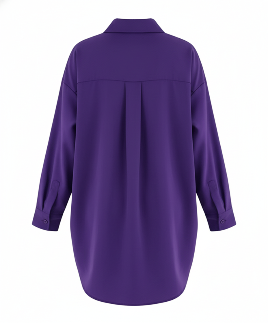 Blusa oversize de manga larga con caída holgada que impone presencia relajada