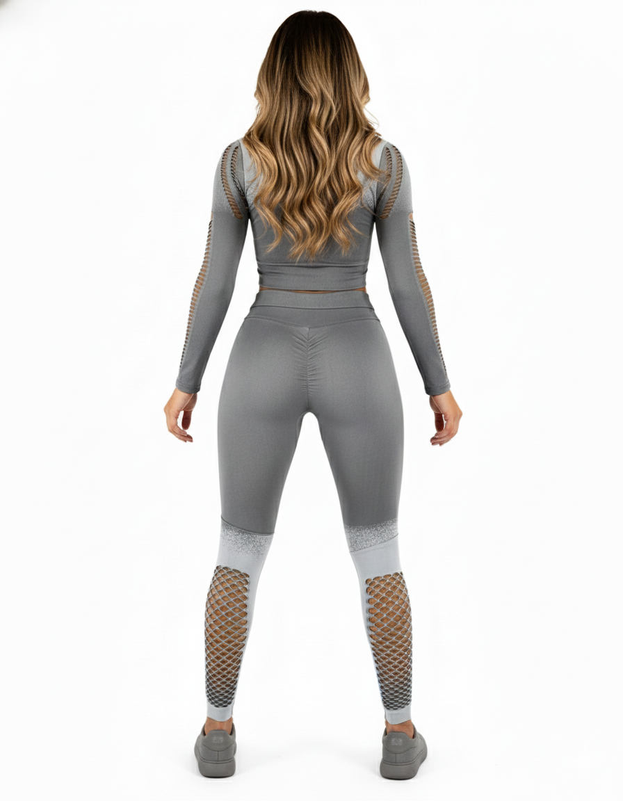 Conjunto deportivo largo con diseño calado y efecto degradado que estiliza tu silueta