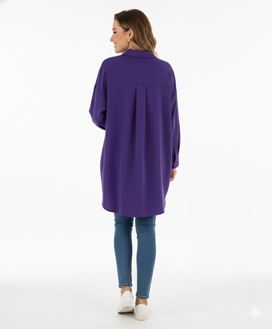 Blusa oversize de manga larga con caída holgada que impone presencia relajada