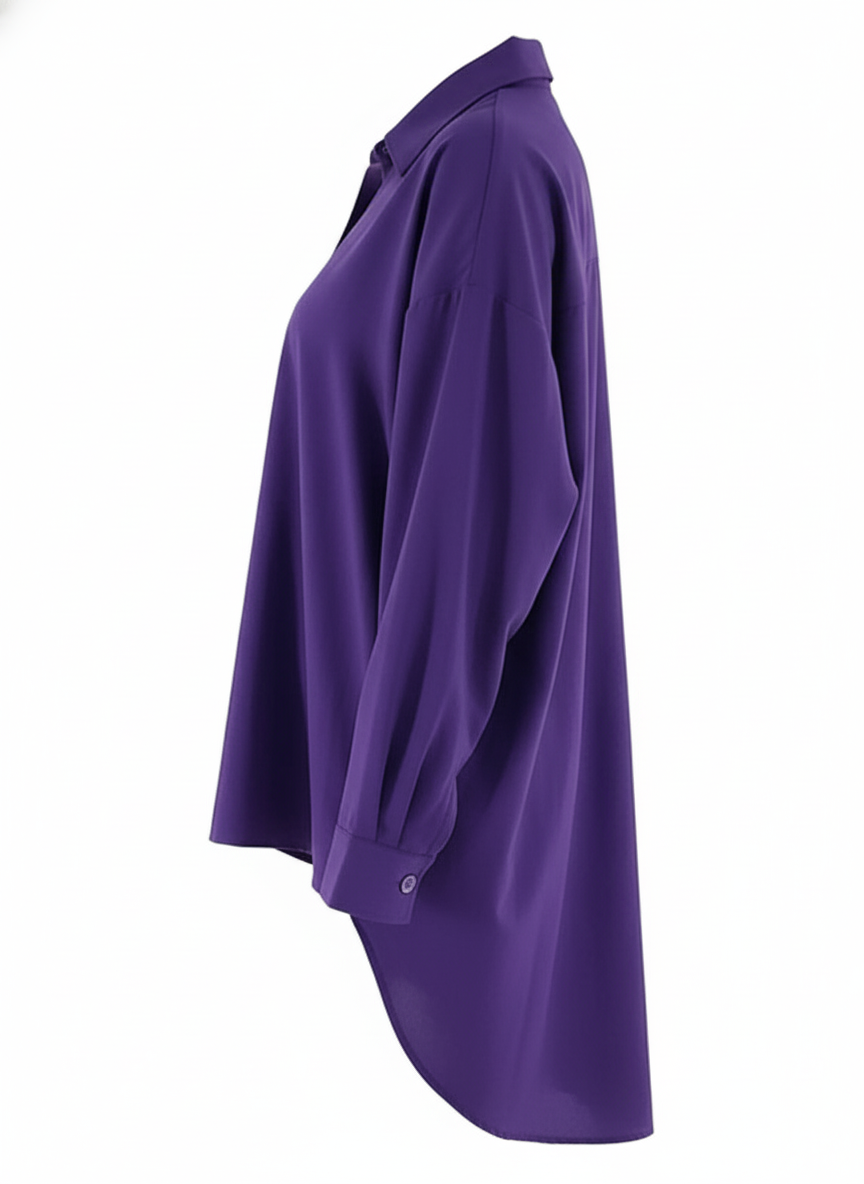 Blusa oversize de manga larga con caída holgada que impone presencia relajada