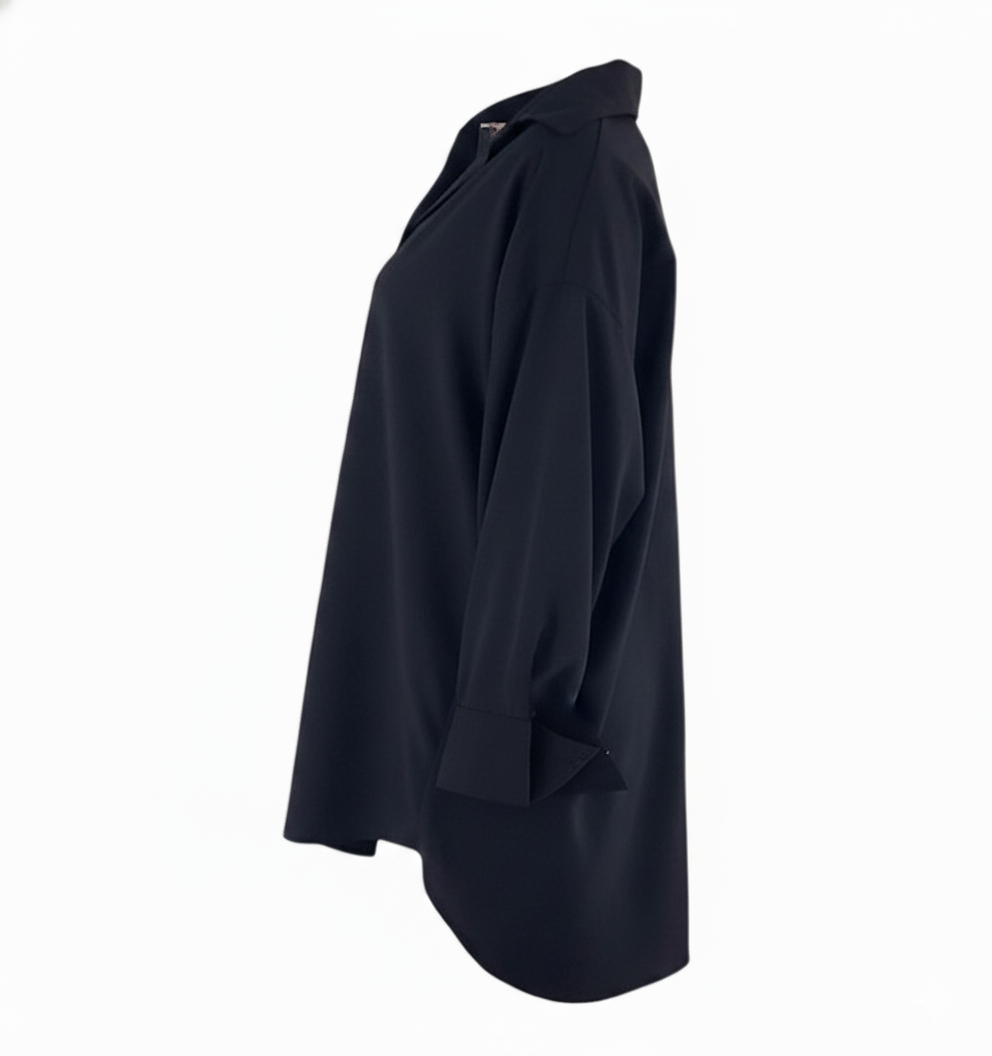 Blusa oversize tipo camisa para un look relajado y moderno