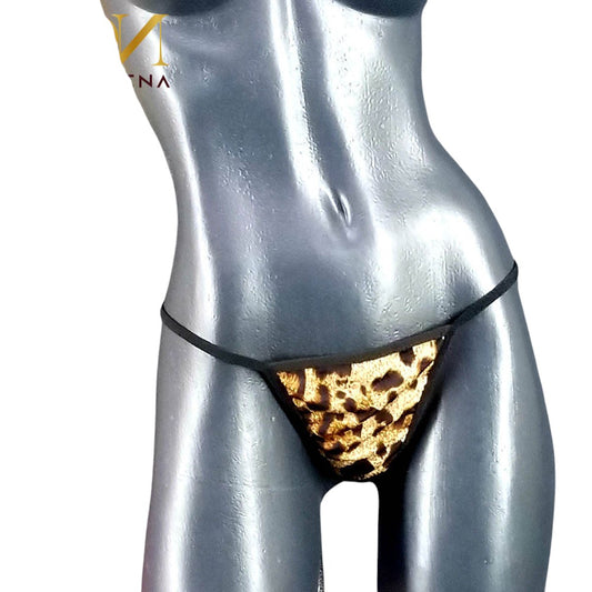 Micro tanga de hilo que eleva tu sensualidad con audacia felina